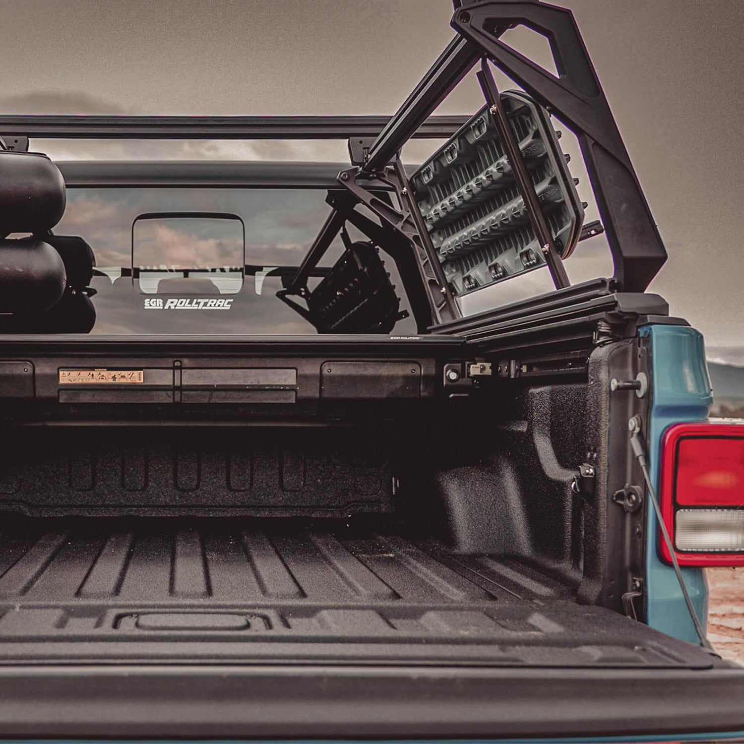 ROLLED BACK TONNEAU COVER ON ACS FORGED TONNEAU BED RACK 