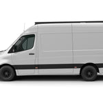 SIDE VIEW OF WHITE SPRINTER BUS WITH ROOF RACK