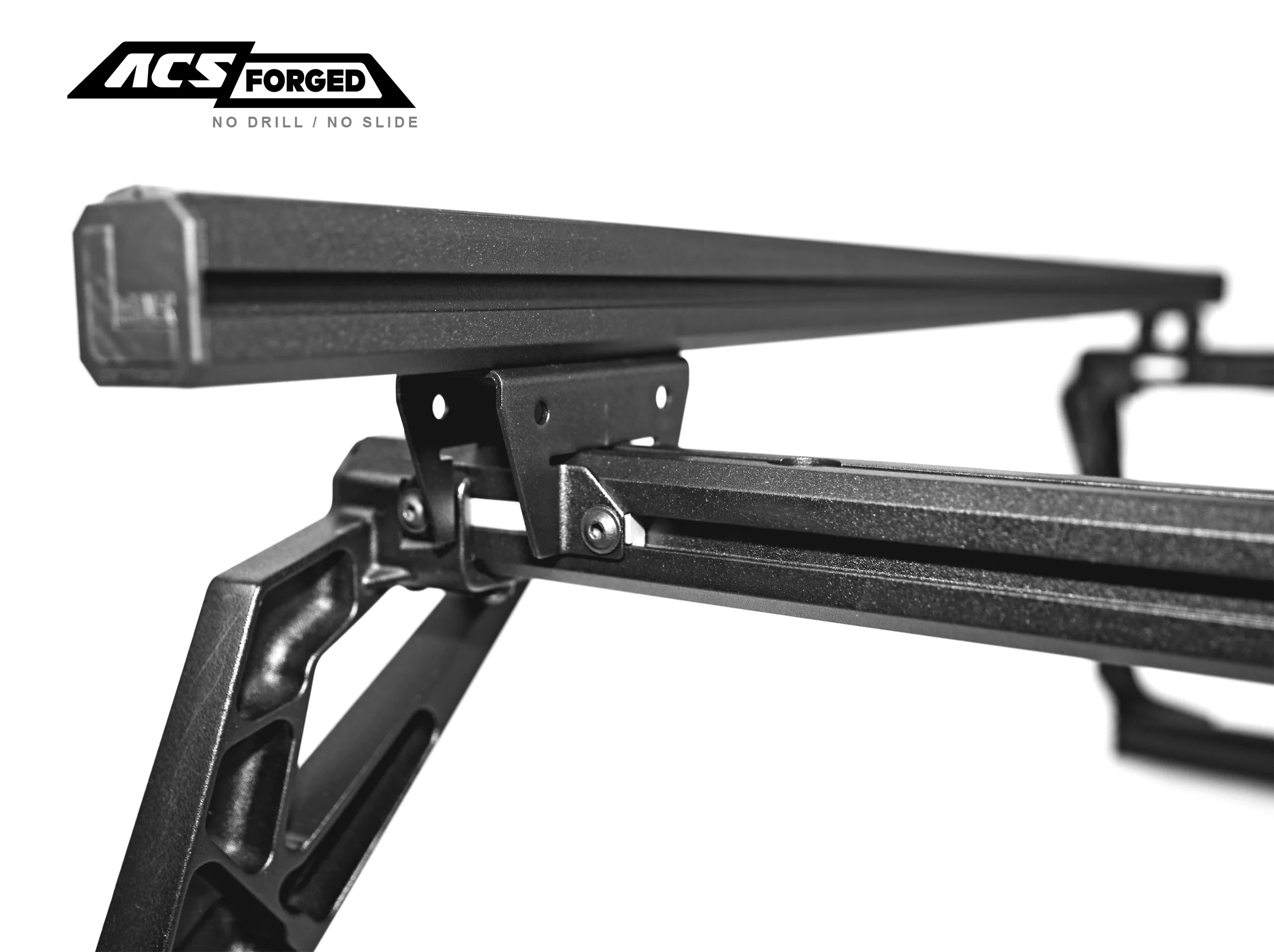 CLOSE UP VIEW OF STATIONARY LOAD BAR MOUNTED WITH BRACKET ON THE ACS NO DRILL NO SLIDE BED RACK 