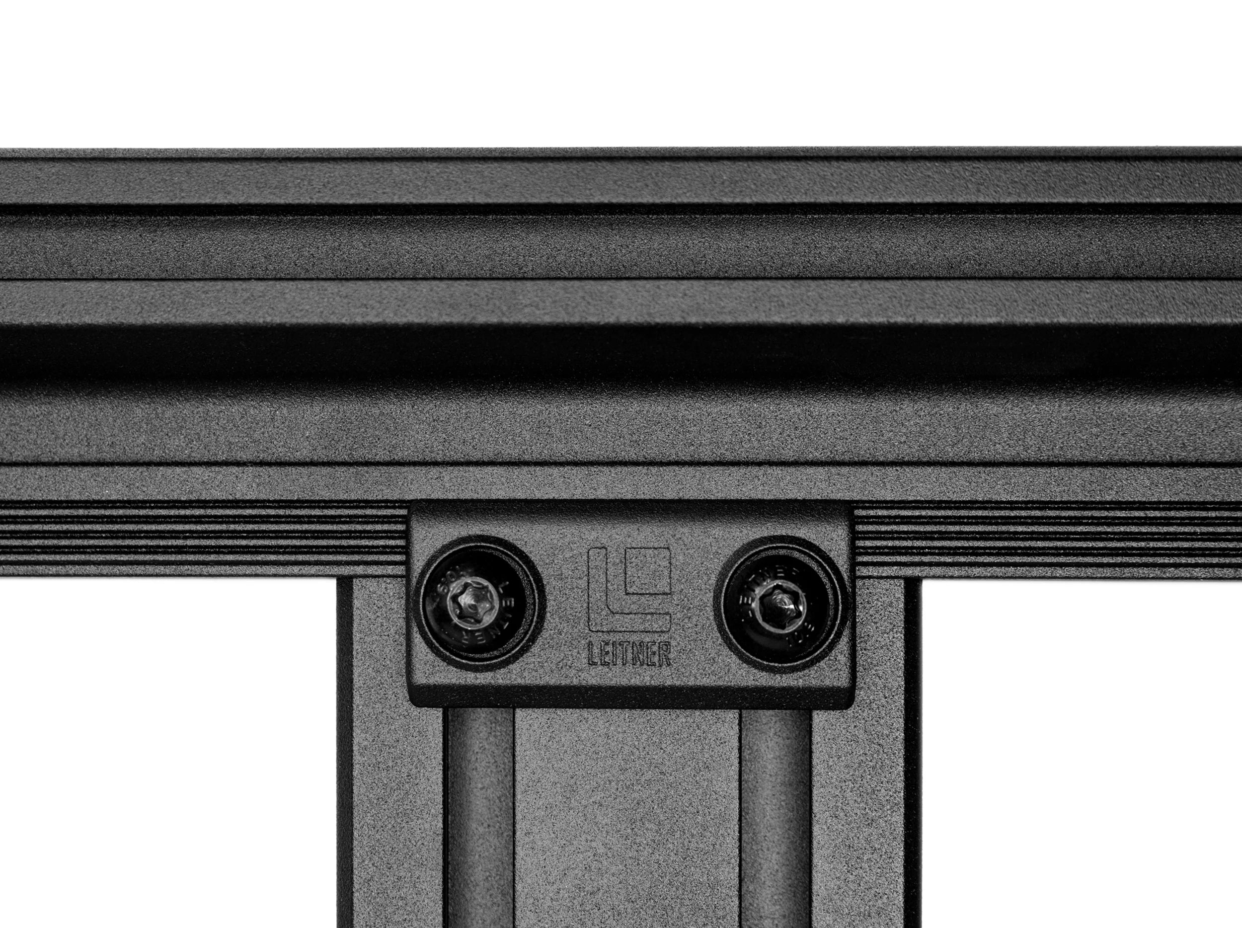 CLOSE UP VIEW OF SIDE EXTRUSION CONNECTED TO LOAD BAR OF ACS ROOF RACK 