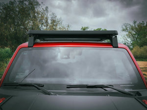 FRONT VIEW OF ACS ROOF RACK INSTALLED ON RED FORD BRONCO