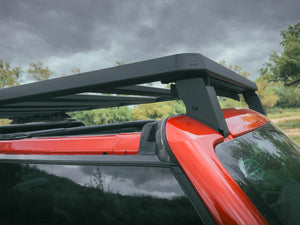 CLOSE UP VIEW OF ACS ROOF RACK SHOWING CORNER WITH LEITNER LOGO