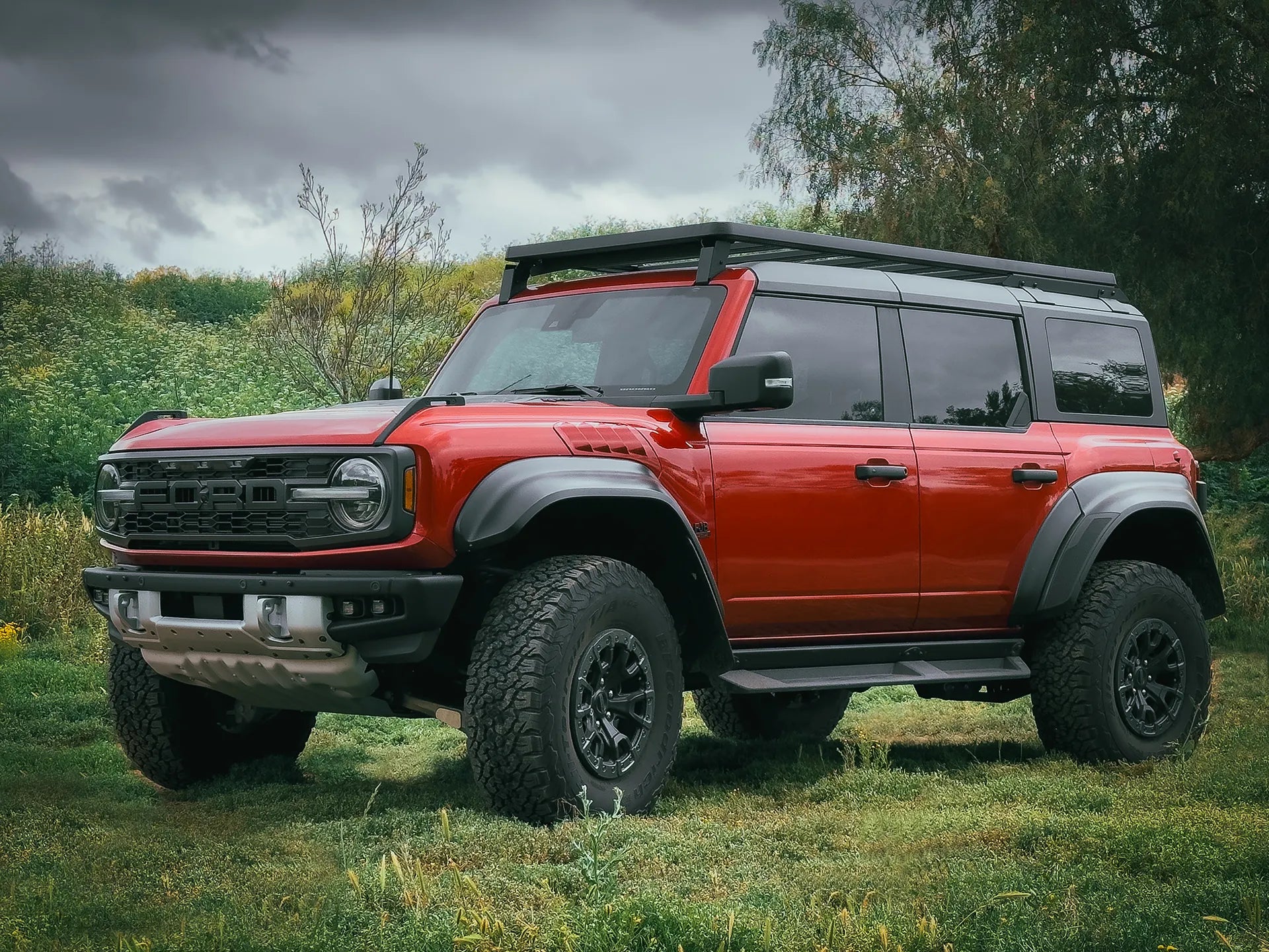 SIDE FRONT VIEW RED FORD BRONCO WITH ACS ROOF RACK INSTALLED