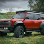 SIDE FRONT VIEW RED FORD BRONCO WITH ACS ROOF RACK INSTALLED