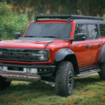 RED FORD BRONCO OUTSIDE WITH ACS ROOF RACK INSTALLED 