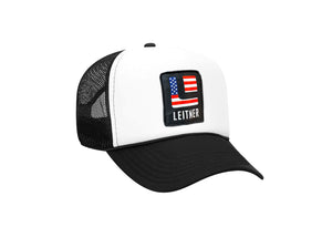  FRONT VIEW BLACK AND WHITE FOAM TRUCKER HAT WITH USA LEITNER LOGO