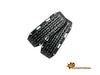 black recovery boards with raised traction lugs, designed to help vehicles gain traction in sand, mud, or snow