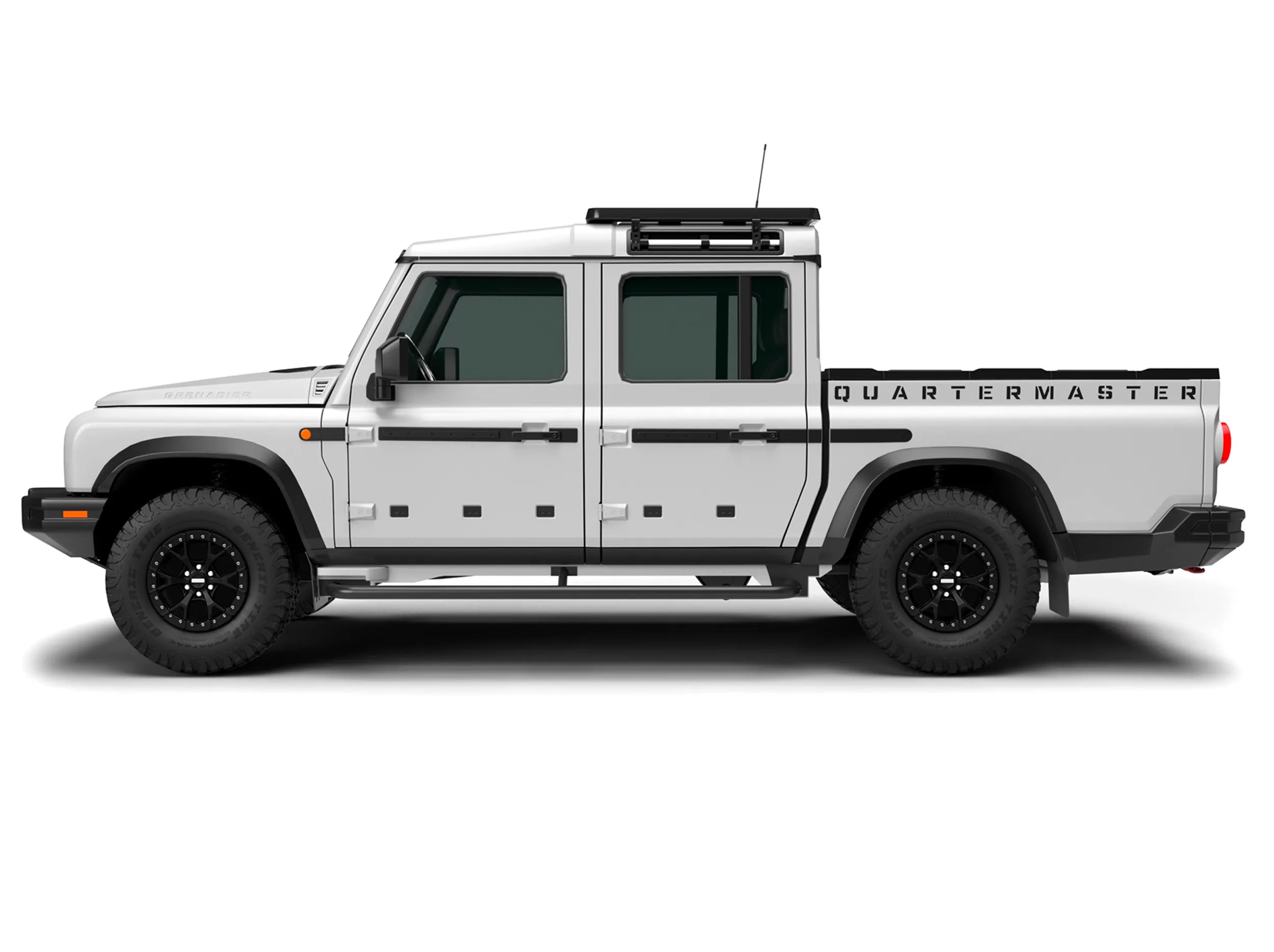 SIDE VIEW OF GRENADIER QUARTERMASTER WITH HALF LENGTH ACS ROOF RACK MOUNTED