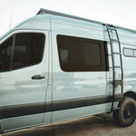 SIDE VIEW OF SPRINTER WITH ROOF RACK MOUNTED 