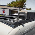 ABOVE CLOSE UP VIEW OF GEAR POD ROOFS MOUNTED ON ROOF RACK