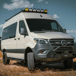 FRONT VIEW OF SPRINTER BUS WITH ROOF RACK