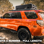 ORANGE TOYOTA 4RUNNER WITH FULL LENGTH ACS ROOF RACK INSTALLED WITH GEARPOD ROOFS MOUNTED