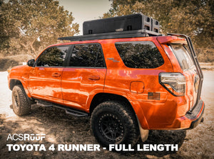 ORANGE TOYOTA 4RUNNER WITH FULL LENGTH ACS ROOF RACK INSTALLED WITH GEARPOD ROOFS MOUNTED